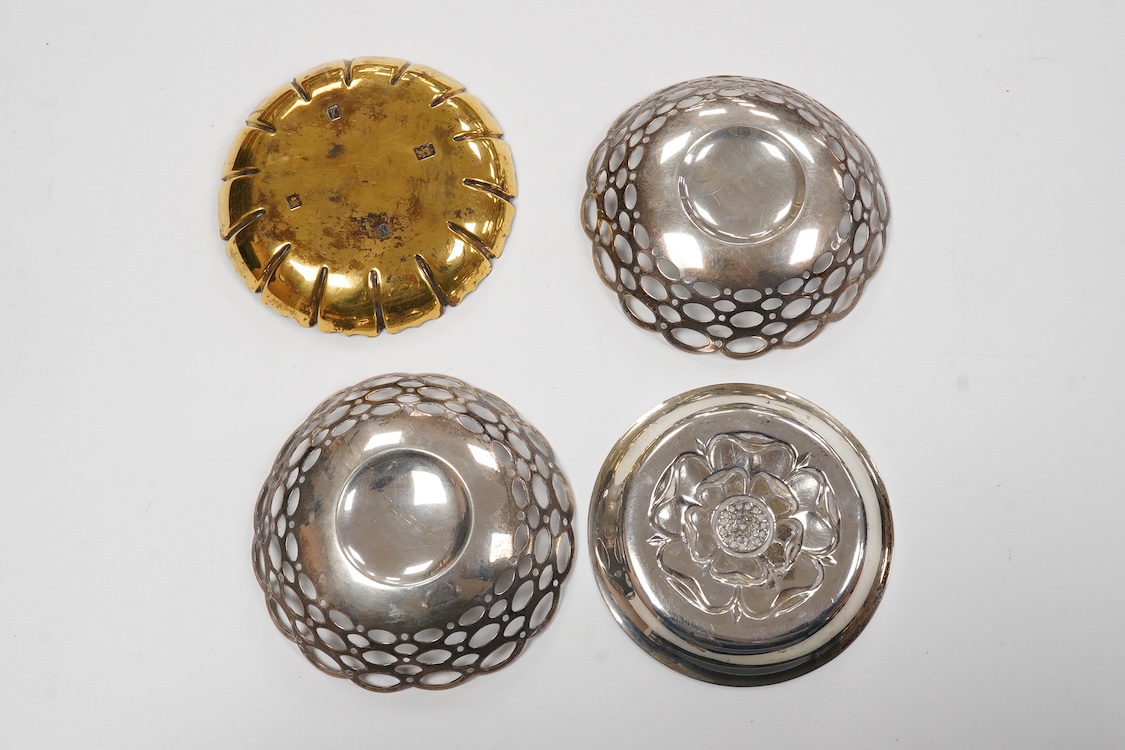 An Elizabeth II silver gilt small dish, by C.J. Vander Ltd, London, 1964, 10cm, a pair of pierced silver bonbon dishes and a small silver Tudor Rose dish, 6.4oz.